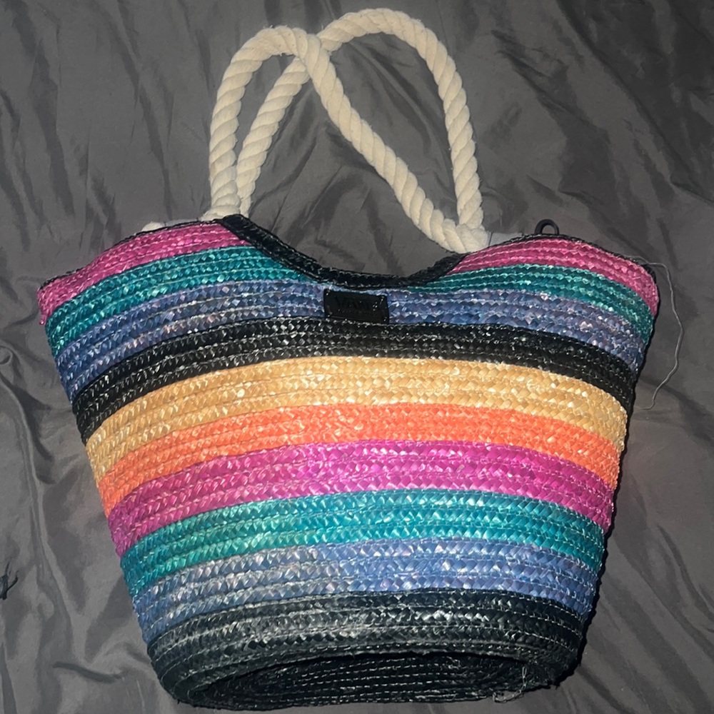Vans handbag . Normal wear and tear. Perfect for fun in the sun! Colorful !